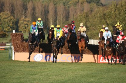 National Hunt Racing - Horses Jumping Fence