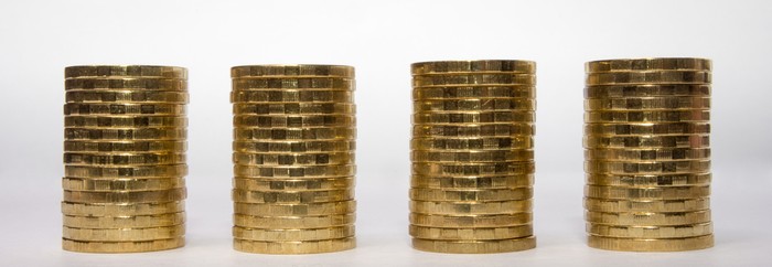 Four Equal Stacks of Coins