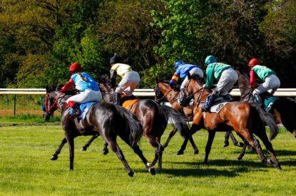 Group of Jockeys During Race