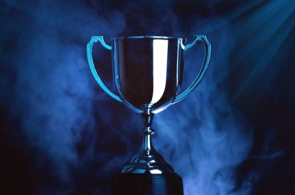 Silver Trophy Under Spotlights