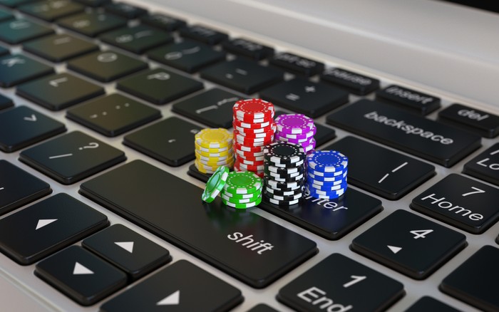 Casino Chips on Laptop Enter Button