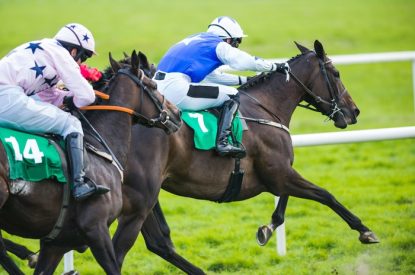 Jockey in Blue Silks Leading Race