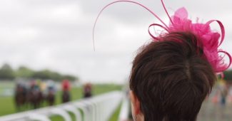 Lady Watching Race at Goodwood