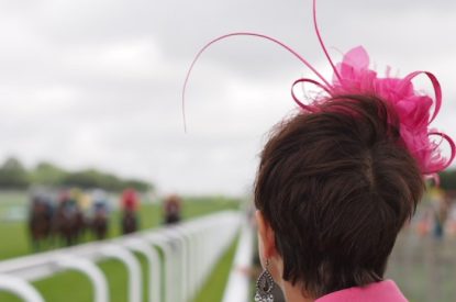 Lady Watching Race at Goodwood