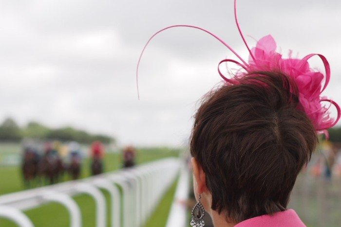Lady Watching Race at Goodwood
